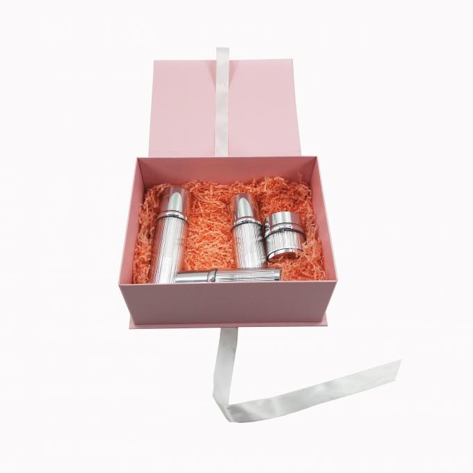 Cosmetico rosa del cartone che imballa la chiusura pieghevole del nastro dei contenitori di regalo per cura di pelle
