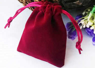 Porcellana Borse di cordone del velluto dell&#039;imballaggio dei gioielli per il regalo che dà corda di timbratura calda fabbrica